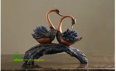 Cặp thiên nga đậu cành cây trang trí