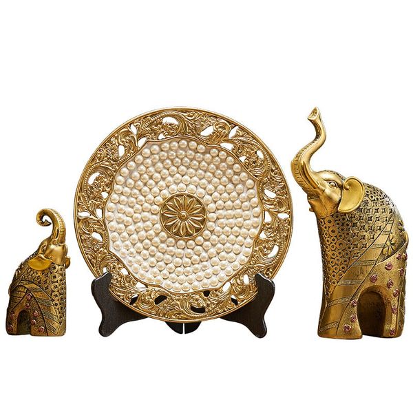 Bộ tượng voi vàng kèm đĩa trang trí