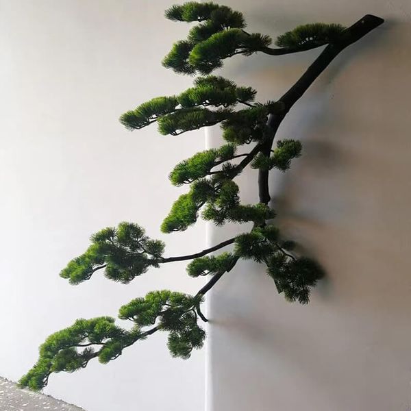 Cây tùng giả treo tường trang trí