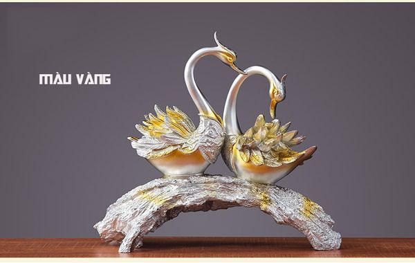 Cặp thiên nga đậu cành cây trang trí