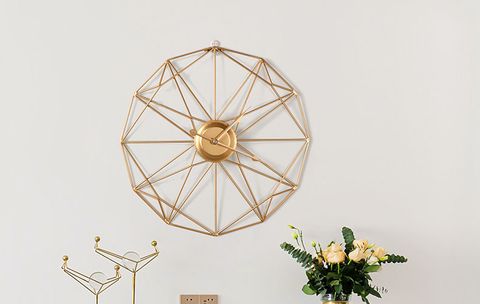 dong-ho-treo-tuong-sat-uong-nghe-thuat