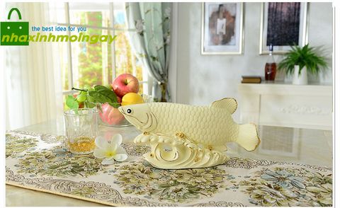 Tượng cá kim long cưỡi sóng