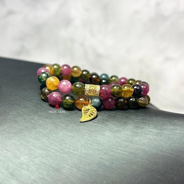 Vòng tay Tourmaline mix charm ống kim tiền và lá bồ đề vàng 10K