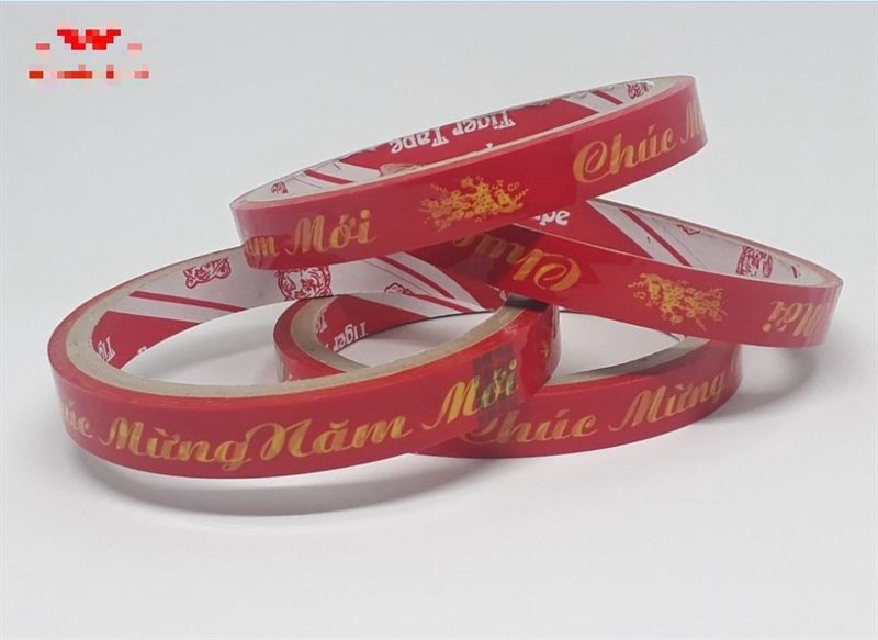 BĂNG KEO CHÚC MỪNG NĂM MỚI 18mx1.2cm - 24cuộn/ cây