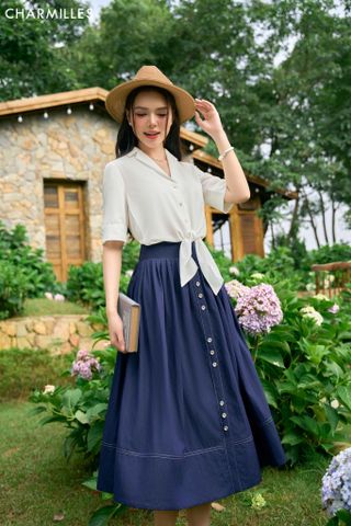Chân váy diễu chỉ phối khuy