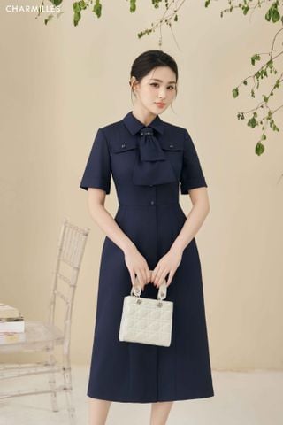 Đầm nơ tầng cài trước