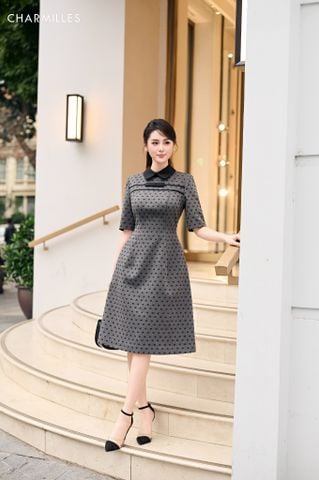 Đầm chấm bi đính nơ ngực