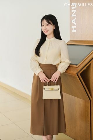 Chân váy mí cạp phối khuy