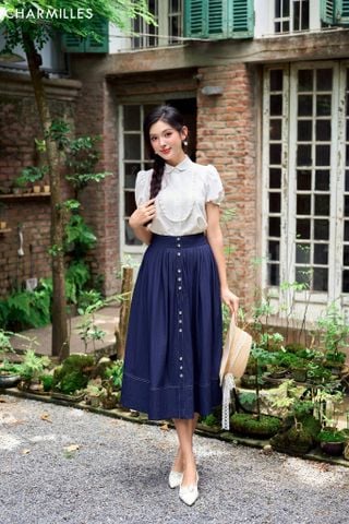 Chân váy diễu chỉ phối khuy