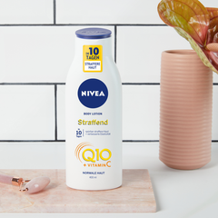 NIVEA Q10 Body Plus C - Kem dưỡng thể thẩm thấu nhanh, sáng da, căng da, chai 400 ml