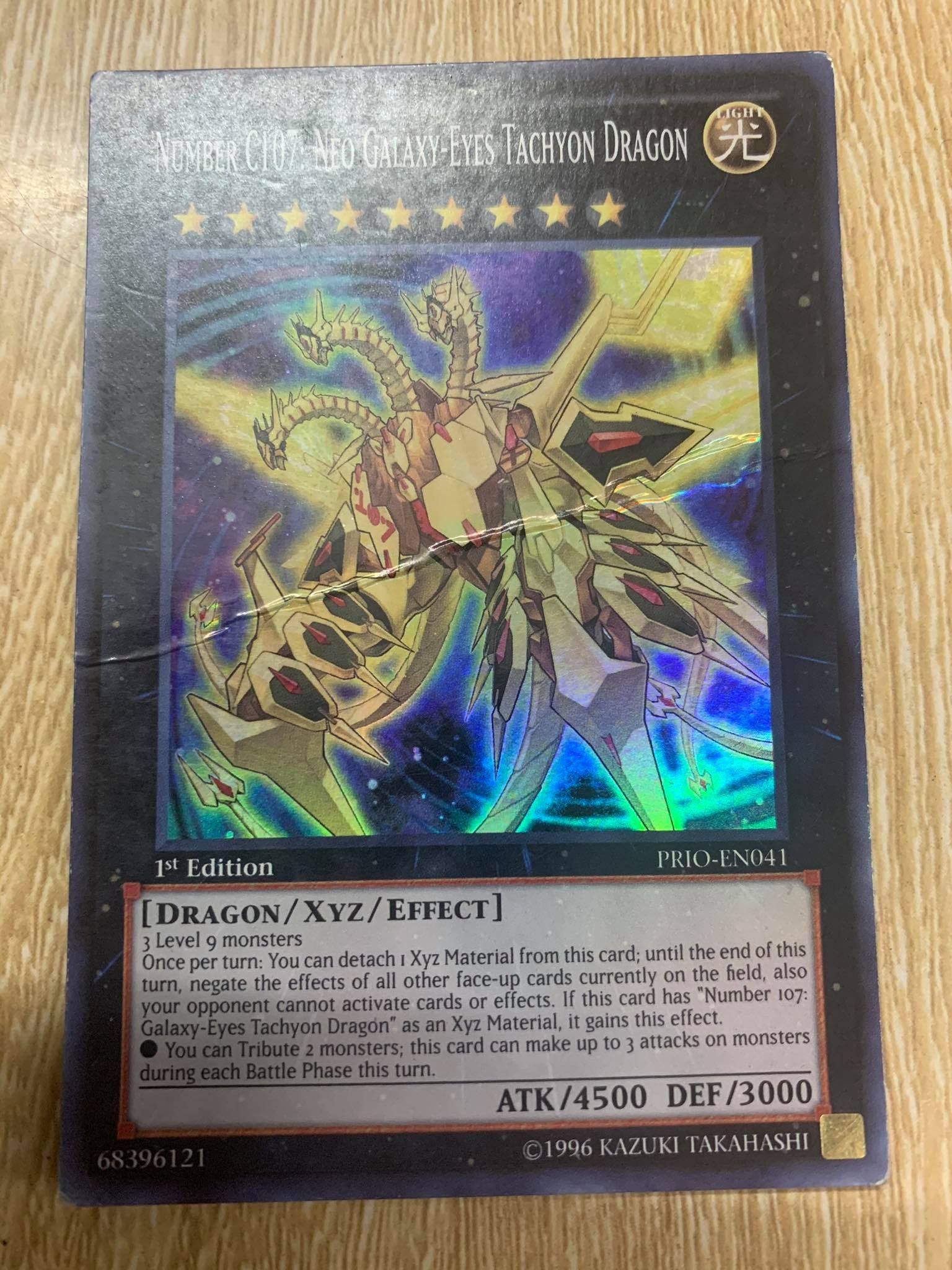 [ US ] Number C107 : Neo Galaxy-Eyes Tachyon Dragon - PRIO-EN041 - Super Rare 1st Edition - Damaged