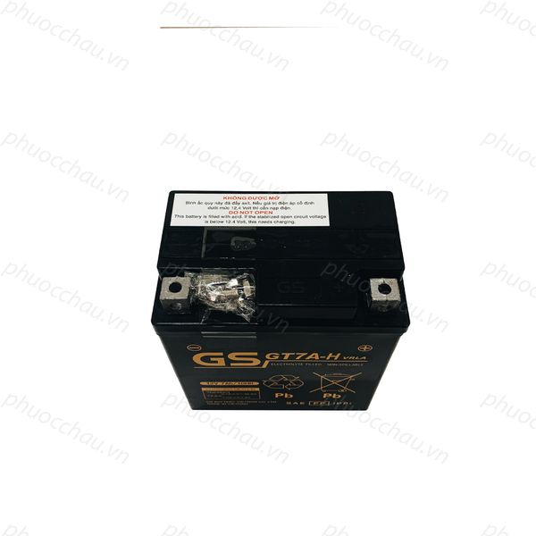 Bình ắc quy khô GS GT7A-H 12V-7Ah nhìn từ trên xuống, tem cảnh báo không mở nắp và cọc bình