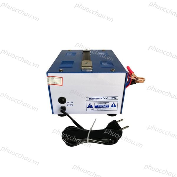 Máy sạc ắc quy HanShin 10A 12V tăng giảm nhìn từ sau, thấy quạt tản nhiệt, dây nguồn AC IN 220V và kẹp cá sấu