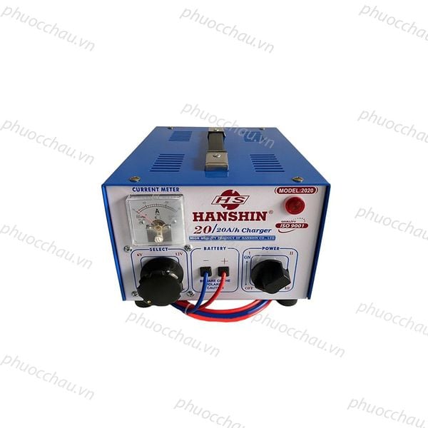 Máy sạc ắc quy HanShin 20A 6V 12V 24V nhìn từ trên xuống, thấy quai xách và khe tản nhiệt vỏ xanh