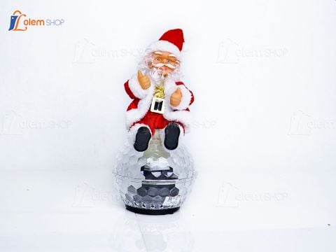 Đồ chơi ông già noel ngồi trên trái châu - Quà tặng giáng sinh