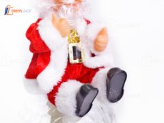 Đồ chơi ông già noel ngồi trên trái châu - Quà tặng giáng sinh