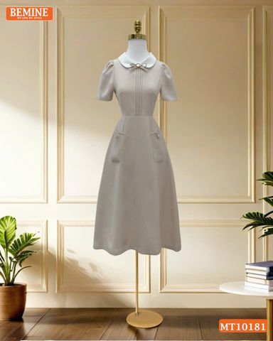 Đầm thiết kế BEMINE cổ sen đính nơ ngực xếp ly dáng chữ A MT10181
