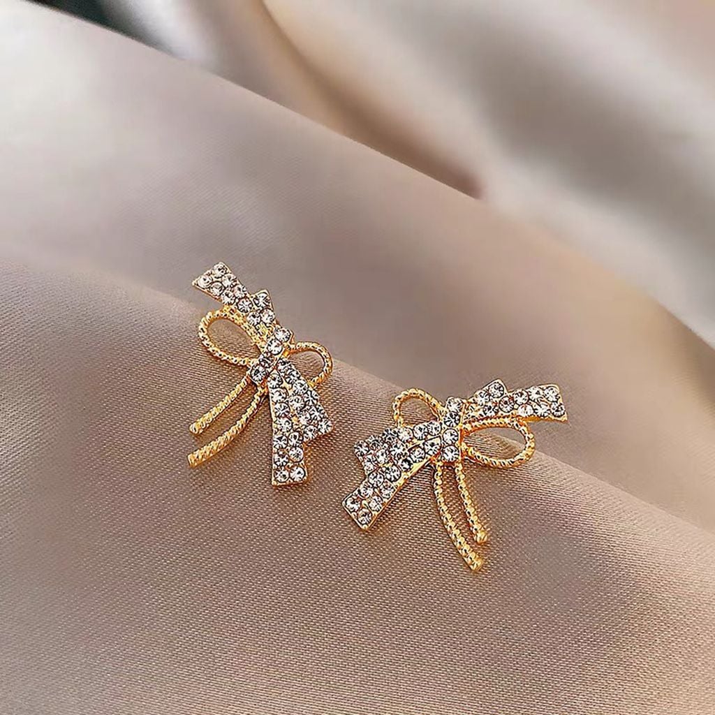 Hoa tai D1622 Nơ vàng phối đá trắng