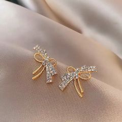 Hoa tai D1622 Nơ vàng phối đá trắng