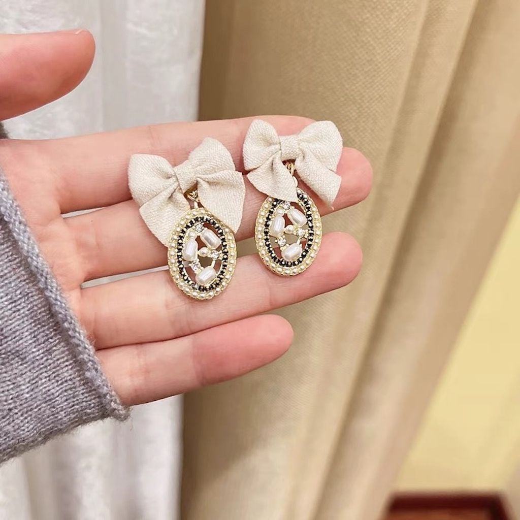 Hoa tai D1801 Nơ kem đá bầu dục