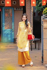 Áo dài cách tân Xuân Y - Thị vàng mai nở