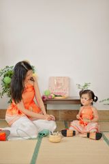 Áo yếm xòe organza Hoa Niên Ca BÉ - Cam