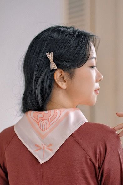 Kẹp tóc nơ ngọc trai