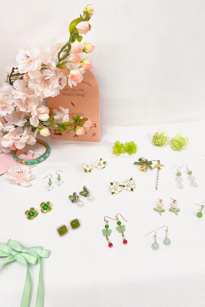 Hoa tai NK-116 hoa 4 cánh xanh lá lấp lánh