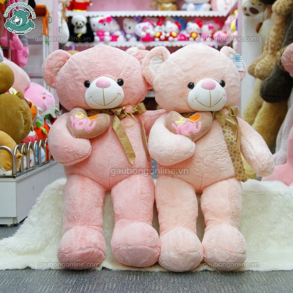 Gấu Bông Teddy Tim Lệch Nơ Hoa