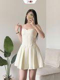  Đầm dây xếp li 