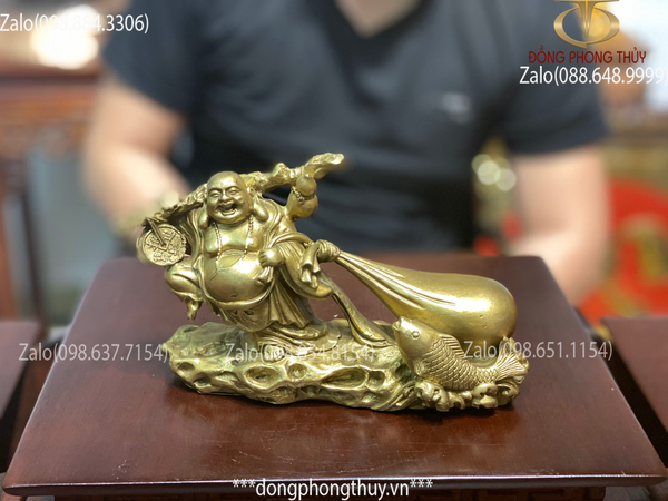 Tượng phật di lặc kéo bao bằng đồng 11cm ngang 17 nặng 550gr