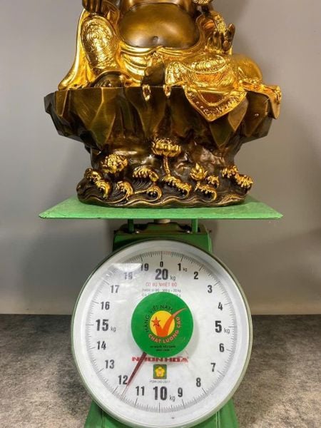Tượng di lặc dát điểm vàng