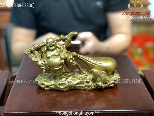 Tượng phật di lặc kéo bao bằng đồng 11cm ngang 17 nặng 550gr