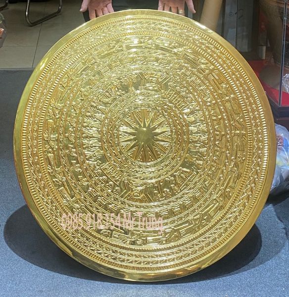 Quà tặng: mặt trống đồng Đông Sơn bằng đồng đỏ dát vàng 24k 80cm nặng 21kg