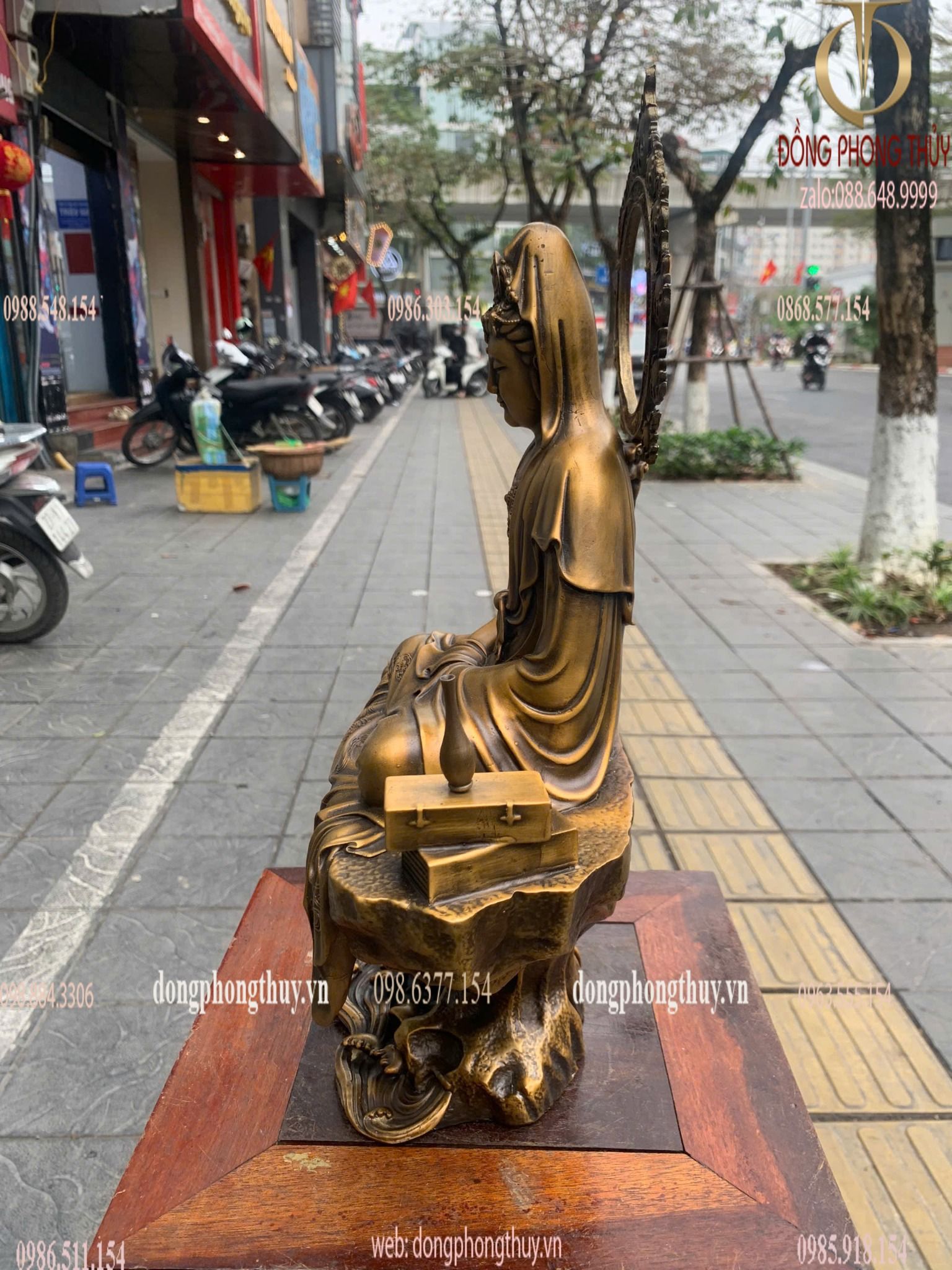 Tượng Quan Âm ngồi bệ đá bằng đồng vàng nguyên chất xi hun