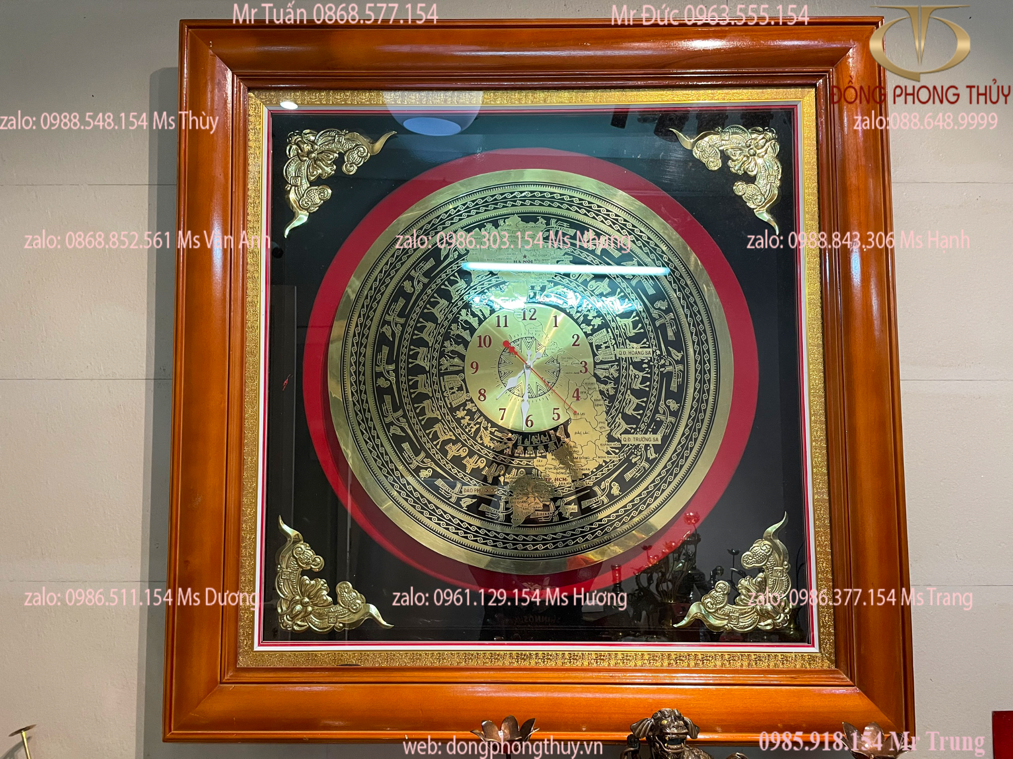 Tranh đồng hồ mặt trống đồng