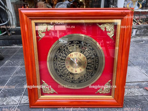Tranh mặt trống đồng hồ khung gỗ