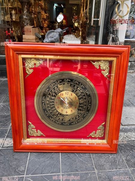 Tranh mặt trống đồng hồ khung gỗ