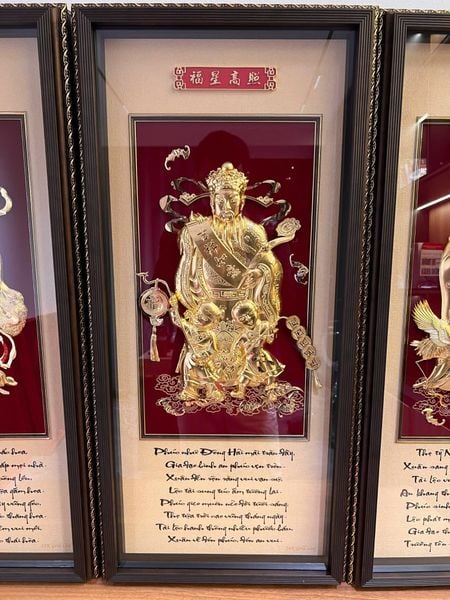 Tranh ông Phúc dát vàng 24k