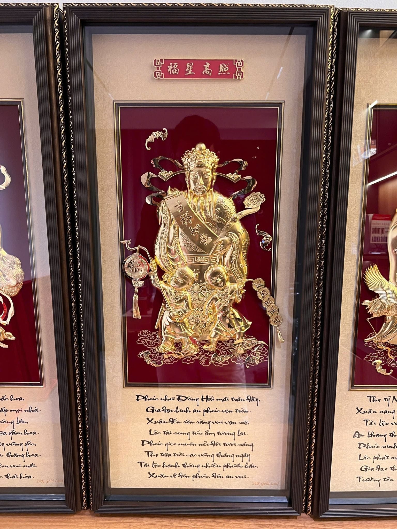 Tranh ông Phúc dát vàng 24k