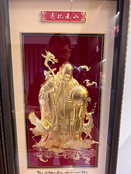 Tranh ông Thọ dát vàng 24k
