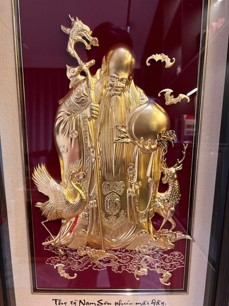 Tranh ông Thọ dát vàng 24k