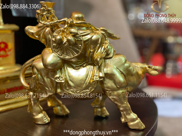 Tượng phật di lặc cưỡi trâu bằng đồng thếp vàng 24k cao 16, nặng 1,5kg