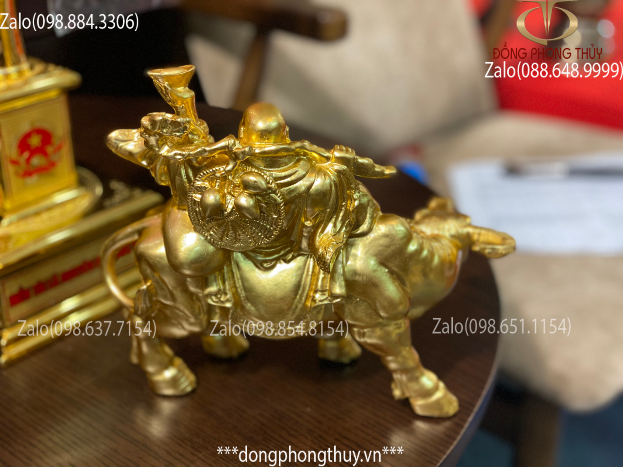 Tượng di lặc cưỡi trâu bằng đồng thếp vàng 24k