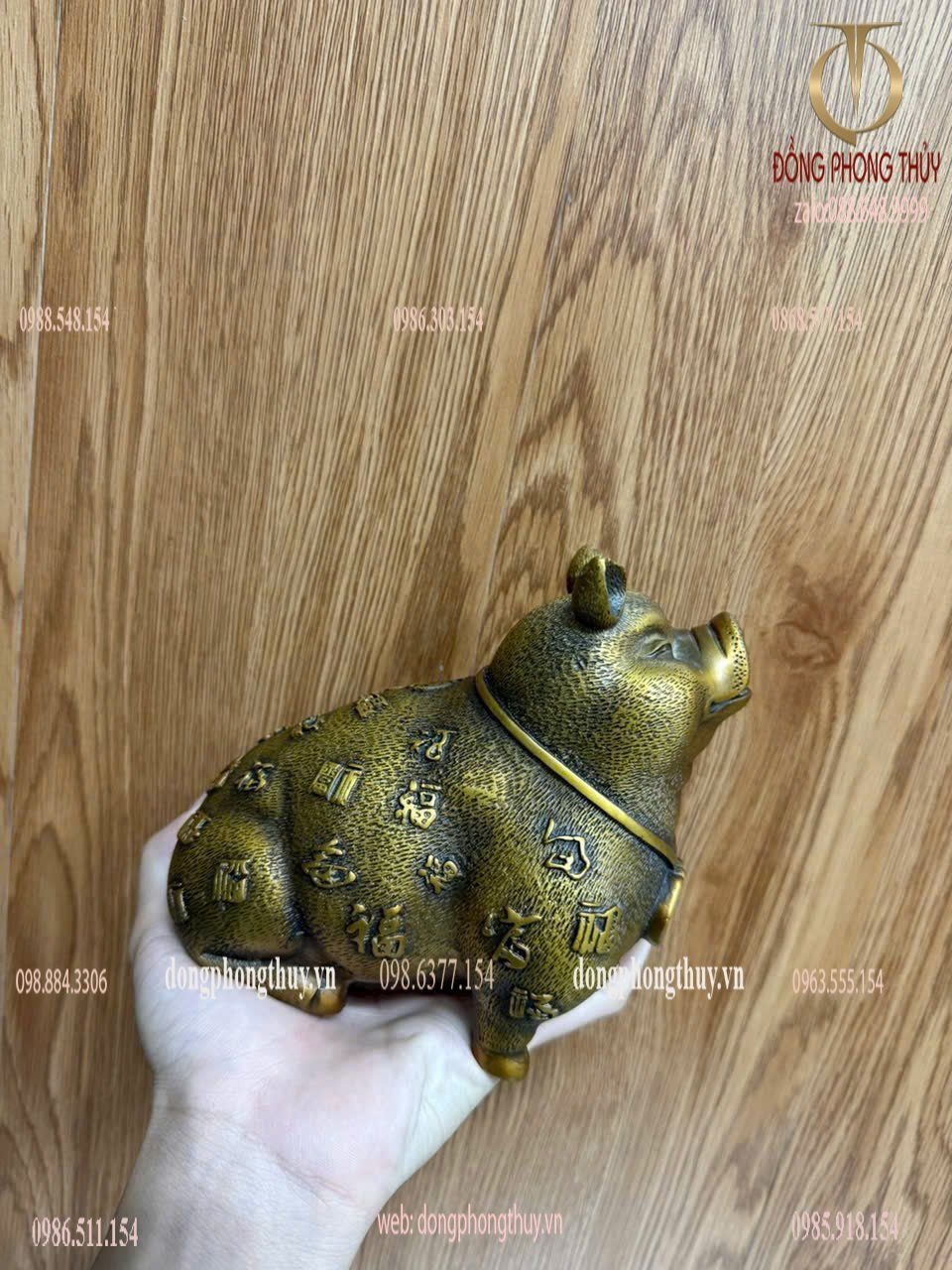 Tượng heo bằng đồng