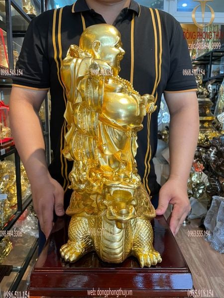Tượng di lặc cưỡi long quy bằng đồng dát vàng 24K cao 48cm, ngang 36cm, rộng 20cm, nặng 20kg