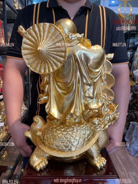 Tượng di lặc cưỡi long quy bằng đồng dát vàng 24K cao 48cm, ngang 36cm, rộng 20cm, nặng 20kg