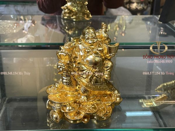 tượng phật di lặc cưỡi long quy gánh tiền dát vàng 24k Cao 12