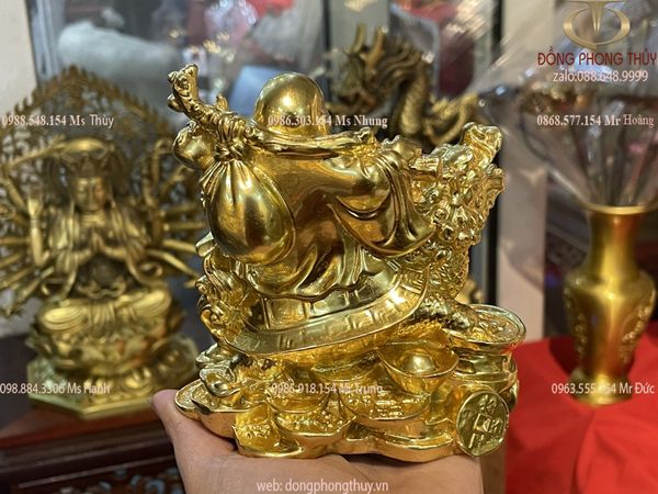 tượng phật di lặc cưỡi long quy gánh tiền dát vàng 24k Cao 12