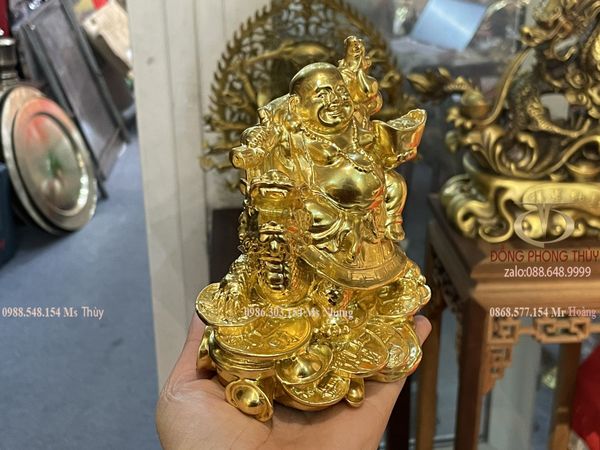 tượng phật di lặc cưỡi long quy gánh tiền dát vàng 24k Cao 12